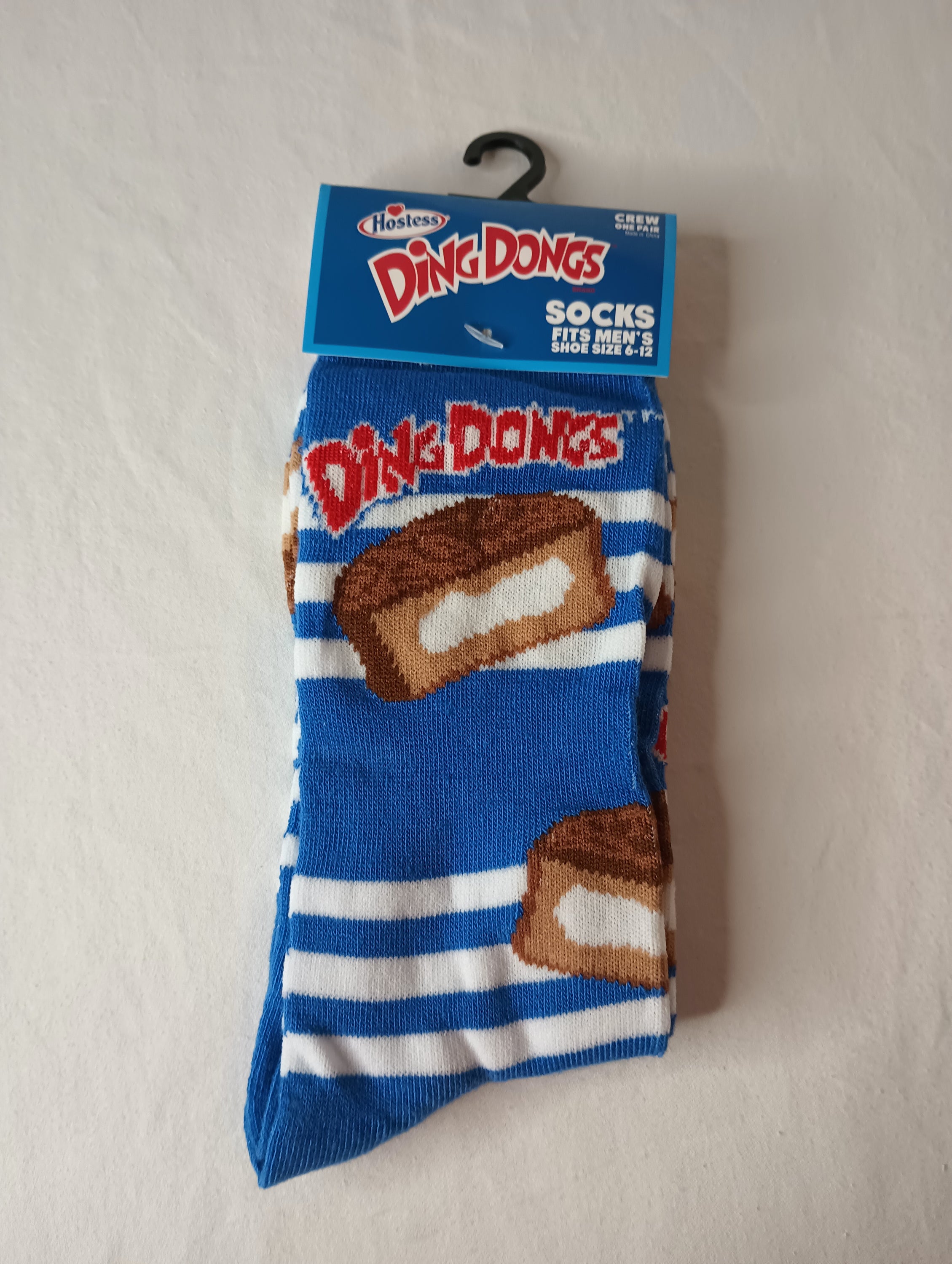 DING DONGS Crew Socks in blue, white, and multi colors, designed for men's shoe sizes 6-12, showcasing a comfortable and stylish crew length.